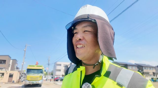 高校相撲経験者ならではの頼れる笑顔。金沢市の舗装会社ソテックで働く施工管理の先輩社員。